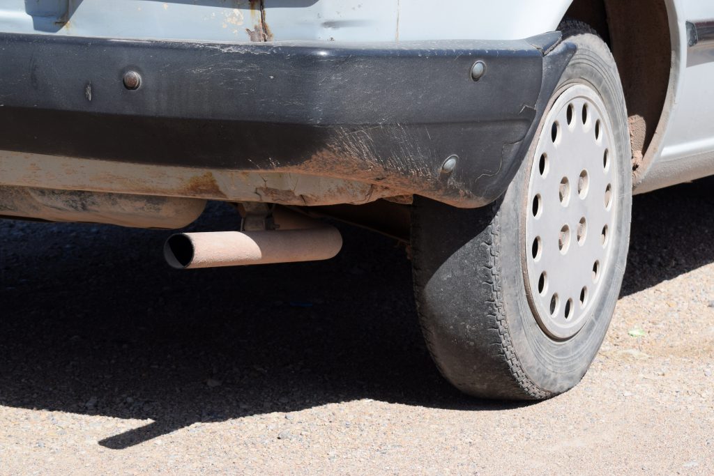 An older truck with bald tires