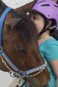 Copy of b smiley and purple helmet 200x300 1 Giroux Pappas Trial Attorneys